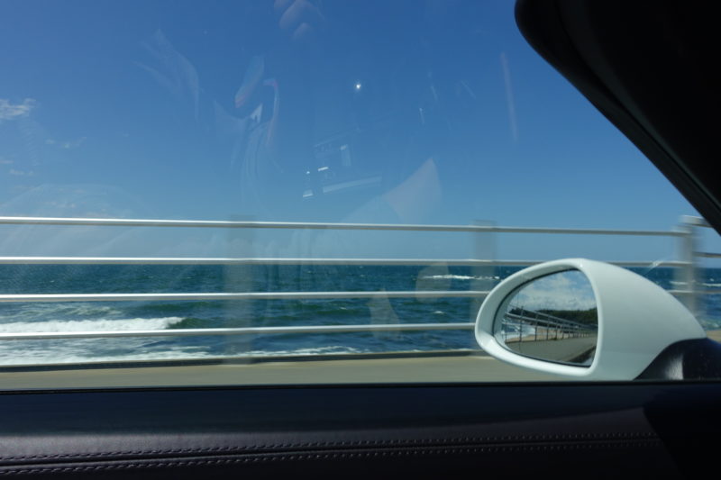 Boxster driving along the seaside